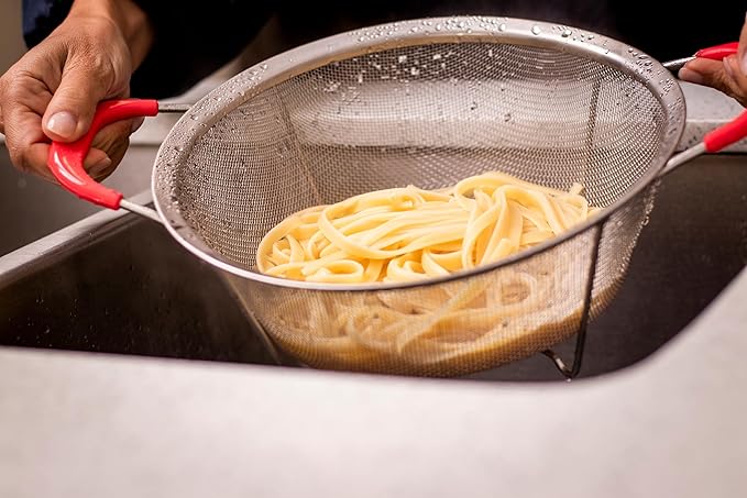 Hercules Chef by Mundial 9.8" Stainless Steel Colander Strainer with Red Silicone Handles – Heavy-Duty Fine Mesh for Pasta, Vegetables & Fruits – Dishwasher Safe Kitchen Essential
