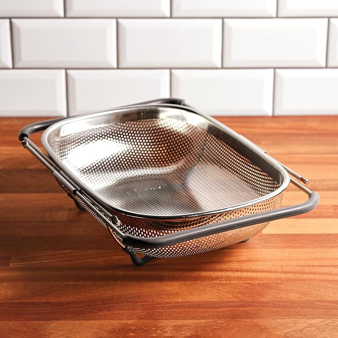 Rachael Ray Tools and Gadgets Over-The-Sink Colander/Strainer for Pasta, Fruits, Veggies, Expandable Silicone Grips, Dishwasher Safe, 4.5 Quart, Stainless Steel with Gray Handles