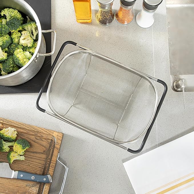 Restaurantware Colander 1 Count 5.5 qt Dishwasher-Safe Stainless Steel Coarse Mesh Colander with Over-The-Sink Expandable Handles Kitchen Strainer Basket for Pasta, Fruits, and Vegetables
